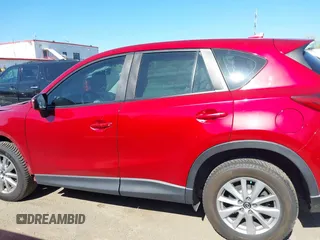 2016 Mazda CX-5 Sport with VIN JM3KE4BY7G0805631, listed as a IAAI auction lot 42028606 with 93,659 mi miles and . Bid and sale history available at carsss.com. Image 14.