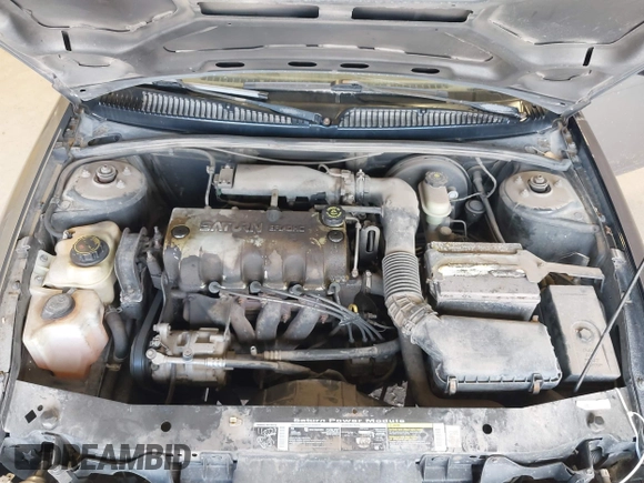 1999 Saturn SL z VIN 1G8ZF5287XZ157353, wystawiony jako IAAI lot #42310900 z przebiegiem 372 049 mil mil oraz . Historia ofert i sprzedaży dostępna na DreamBid. Obrazek 10.