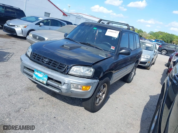 1998 Toyota RAV4 with VIN JT3GP10V7W7037711, listed as a IAAI auction lot 42081313 with 233,554 mi miles. Bid and sale history available at carsss.com. Image 2.