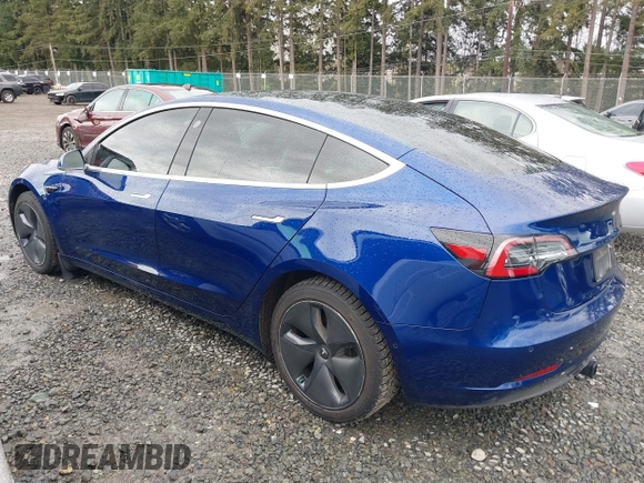2019 Tesla Model 3 Long Range with VIN 5YJ3E1EB8KF512950, listed as a IAAI auction lot 41836349 with 55,607 mi miles and . Bid and sale history available at DreamBid. Image 3.