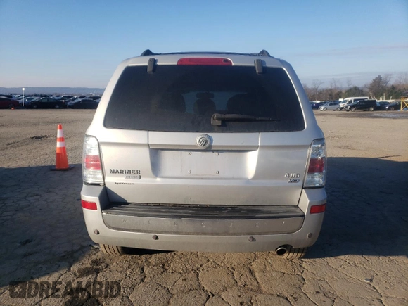 2008 Mercury Mariner Premier z VIN 4M2CU97108KJ43593, wystawiony jako Copart lot #62006105 z przebiegiem 124 233 mil mil oraz Szkoda całkowita • Salvage title. Historia ofert i sprzedaży dostępna na DreamBid. Obrazek 6.