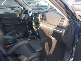 2018 MINI Countryman Cooper S z VIN WMZYT5C3XJ3E60444, wystawiony jako IAAI lot #42422793 z przebiegiem 96 722 mil mil oraz . Historia ofert i sprzedaży dostępna na DreamBid. Obrazek 5.