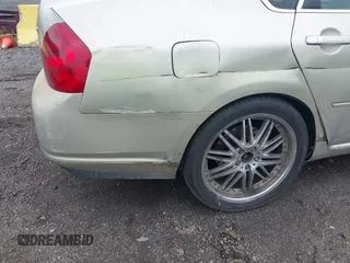 2006 Infiniti M Sport z VIN JNKBY01E06M207564, wystawiony jako IAAI lot #42384952 z przebiegiem 189 804 mil mil oraz . Historia ofert i sprzedaży dostępna na DreamBid. Obrazek 14.