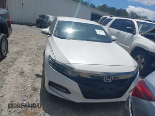 2019 Honda Accord Sport with VIN 1HGCV1F31KA029379, listed as a IAAI auction lot 42156139 with 58,238 mi miles and . Bid and sale history available at DreamBid. Image 12.
