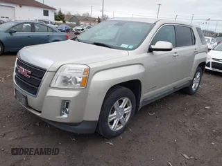 2014 GMC Terrain SLE with VIN 2GKALMEK9E6318683, listed as a IAAI auction lot 42059976 with 137,140 mi miles. Bid and sale history available at carsss.com. Image 2.