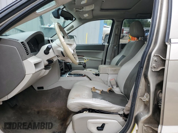 2006 Jeep Grand Cherokee Limited with VIN 1J4HS58N66C211974, listed as a Copart auction lot 60281945 with 220,229 mi miles and Salvage title. Bid and sale history available at DreamBid. Image 7.