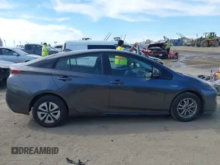 2016 Toyota Prius Four z VIN JTDKARFU2G3022031, wystawiony jako IAAI lot #41631802 z przebiegiem 151 389 mil mil oraz . Historia ofert i sprzedaży dostępna na DreamBid. Obrazek 13.