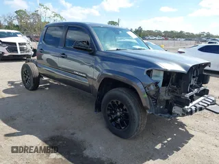 2020 Toyota Tacoma SR5 with VIN 3TMAZ5CN0LM118999, listed as a IAAI auction lot 41609964 with 27,011 mi miles and . Bid and sale history available at DreamBid. Image 1.