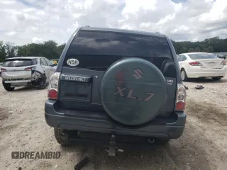 2004 Suzuki XL7 LX z VIN JS3TX92V444111950, wystawiony jako Copart lot #71246234 z przebiegiem Nie podano mil oraz Nie do naprawy. Historia ofert i sprzedaży dostępna na DreamBid. Obrazek 6.