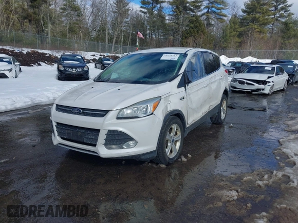2014 Ford Escape SE with VIN 1FMCU9GX7EUD76778, listed as a IAAI auction lot 41679482 with 136,832 mi miles and . Bid and sale history available at carsss.com. Image 2.