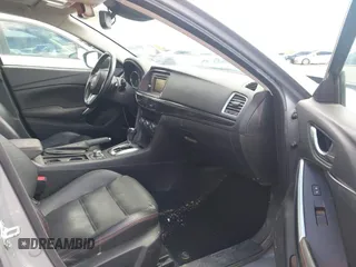 2014 Mazda 6 i Grand Touring with VIN JM1GJ1W57E1104801, listed as a IAAI auction lot 42060144 with 95,212 mi miles. Bid and sale history available at carsss.com. Image 5.