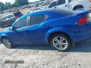 2014 Dodge Avenger SXT z VIN 1C3CDZCG7EN201911, wystawiony jako IAAI lot #42323606 z przebiegiem 149 714 mil mil oraz . Historia ofert i sprzedaży dostępna na DreamBid. Obrazek 14.