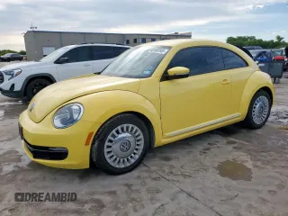2014 Volkswagen Beetle 2.5L z VIN 3VWJX7AT2EM610372, wystawiony jako Copart lot #60163345 z przebiegiem 121 497 mil mil oraz Szkoda całkowita • Salvage title. Historia ofert i sprzedaży dostępna na DreamBid. Obrazek 1.