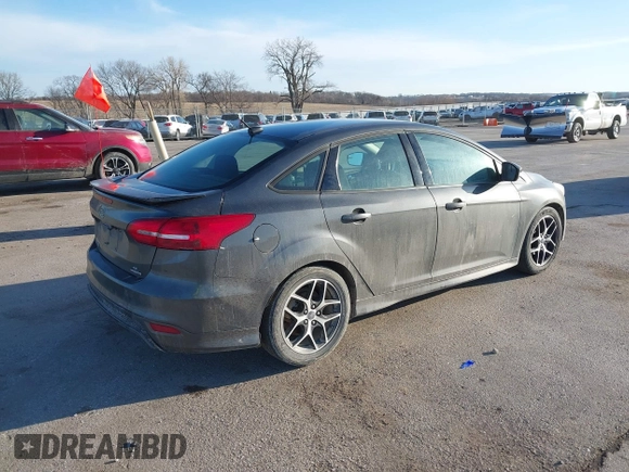 2016 Ford Focus SE with VIN 1FADP3F27GL374188, listed as a IAAI auction lot 41738121 with 125,229 mi miles. Bid and sale history available at carsss.com. Image 4.