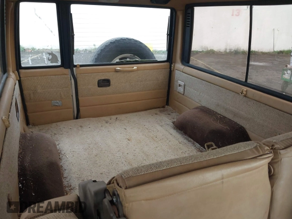 1986 Isuzu Trooper z VIN JACCH55L1G7801560, wystawiony jako IAAI lot #41878592 z przebiegiem 139 020 mil mil oraz . Historia ofert i sprzedaży dostępna na DreamBid. Obrazek 8.