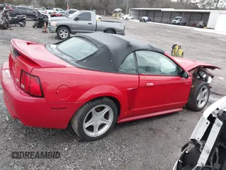 1999 Ford Mustang GT z VIN 1FAFP45XXXF127807, wystawiony jako IAAI lot #41302411 z przebiegiem 156 680 mil mil oraz . Historia ofert i sprzedaży dostępna na DreamBid. Obrazek 14.