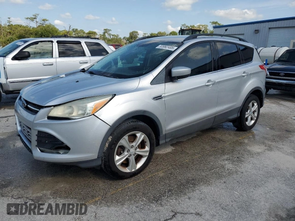 2013 Ford Escape SE with VIN 1FMCU9GX0DUC37218, listed as a Copart auction lot 53992485 with 188,571 mi miles and Salvage Title. Bid and sale history available at DreamBid. Image 1.