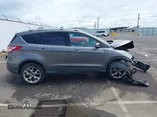 2013 Ford Escape Titanium with VIN 1FMCU9J95DUC95061, listed as a IAAI auction lot 42293047 with 124,641 mi miles and . Bid and sale history available at DreamBid. Image 14.