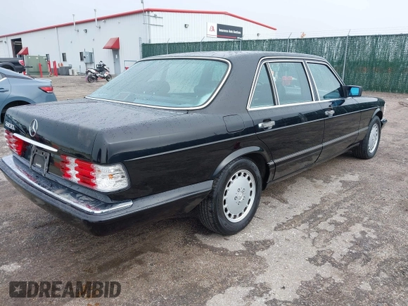 1990 Mercedes-Benz 560 with VIN WDBCA39E4LA534349, listed as a IAAI auction lot 42201056 with 211,470 mi miles and . Bid and sale history available at DreamBid. Image 4.
