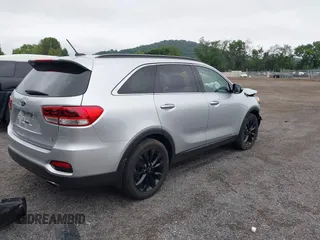 2019 Kia Sorento LX with VIN 5XYPGDA54KG588767, listed as a IAAI auction lot 42683621 with 90,395 mi miles and . Bid and sale history available at DreamBid. Image 4.