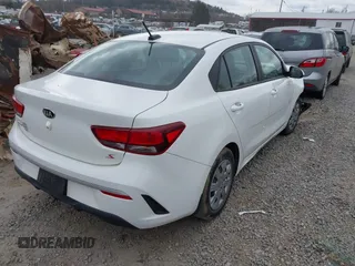 2021 Kia Rio LX with VIN 3KPA24AD3ME400283, listed as a IAAI auction lot 41495331 with 84,920 mi miles. Bid and sale history available at carsss.com. Image 4.