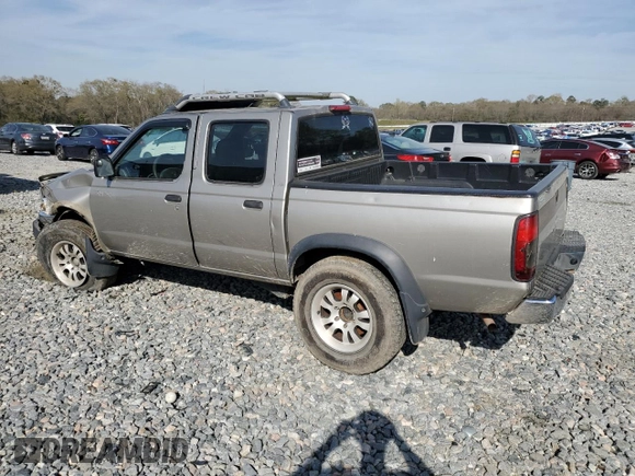2000 Nissan Frontier XE with VIN 1N6ED27T8YC393355, listed as a Copart auction lot 49607575 with 241,813 mi miles and Salvage title. Bid and sale history available at DreamBid. Image 2.