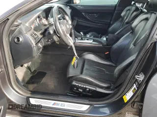 2015 BMW M6 z VIN WBS6C9C58FD467819, wystawiony jako Copart lot #70903944 z przebiegiem 85 596 mil mil oraz Szkoda całkowita • Salvage title. Historia ofert i sprzedaży dostępna na DreamBid. Obrazek 7.