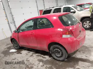 2009 Toyota Yaris with VIN JTDJT903695262292, listed as a IAAI auction lot 41636204 with 157,986 mi miles. Bid and sale history available at carsss.com. Image 14.