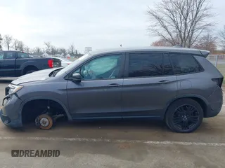 2019 Honda Passport Sport with VIN 5FNYF8H22KB012323, listed as a IAAI auction lot 41880476 with 153,341 mi miles and . Bid and sale history available at carsss.com. Image 14.