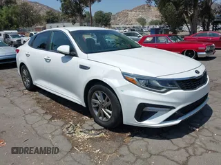 2019 Kia Optima LX with VIN 5XXGT4L3XKG324156, listed as a IAAI auction lot 42803296 with 116,599 mi miles and . Bid and sale history available at DreamBid. Image 1.