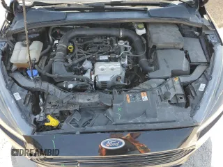 2018 Ford Focus SE z VIN 1FADP3FE5JL236330, wystawiony jako Copart lot #53145065 z przebiegiem 104 228 mil mil oraz Szkoda całkowita • Salvage title. Historia ofert i sprzedaży dostępna na DreamBid. Obrazek 11.