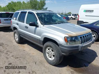 2003 Jeep Grand Cherokee Laredo with VIN 1J4GW48N83C608270, listed as a IAAI auction lot 42721644 with 122,514 mi miles and . Bid and sale history available at DreamBid. Image 1.