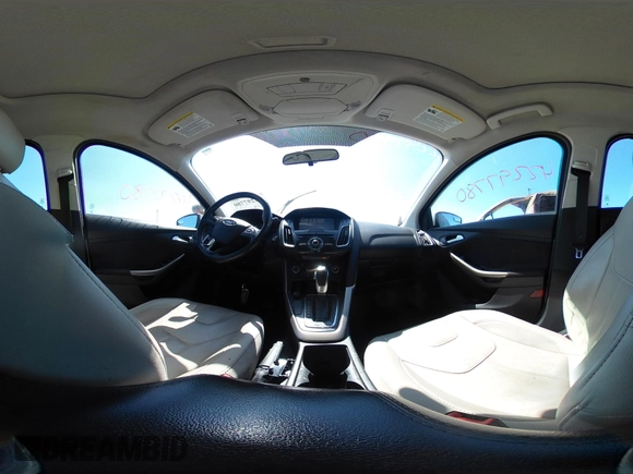 2018 Ford Focus Titanium with VIN 1FADP3N24JL279449, listed as a IAAI auction lot 42297780 with 144,479 mi miles and . Bid and sale history available at DreamBid. Image 18.