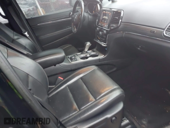 2021 Jeep Grand Cherokee 80th Anniversary with VIN 1C4RJFBG2MC614814, listed as a IAAI auction lot 41486793 with 88,089 mi miles and . Bid and sale history available at DreamBid. Image 5.