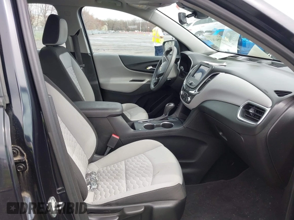 2020 Chevrolet Equinox LS z VIN 2GNAX5EV7L6207540, wystawiony jako IAAI lot #41954763 z przebiegiem 72 082 mil mil oraz . Historia ofert i sprzedaży dostępna na DreamBid. Obrazek 5.