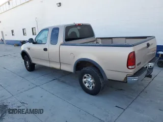 1998 Ford F-250 with VIN 1FTPX28L1WKC07787, listed as a Copart auction lot 75915464 with 199,543 mi miles and Clean title. Bid and sale history available at DreamBid. Image 2.