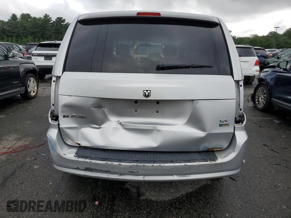 2012 Ram Cargo Van with VIN 2C4RDGAG1CR385997, listed as a Copart auction lot 67888854 with 329,287 mi miles and Salvage Title. Bid and sale history available at carsss.com. Image 6.
