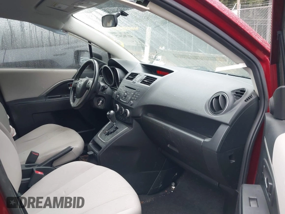 2015 Mazda 5 Touring with VIN JM1CW2CL0F0188959, listed as a IAAI auction lot 41702425 with 104,952 mi miles. Bid and sale history available at carsss.com. Image 5.