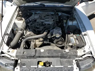 2000 Ford Mustang z VIN 1FAFP4045YF302687, wystawiony jako Copart lot #58044485 z przebiegiem 191 961 mil mil oraz Szkoda całkowita • Salvage title. Historia ofert i sprzedaży dostępna na DreamBid. Obrazek 11.