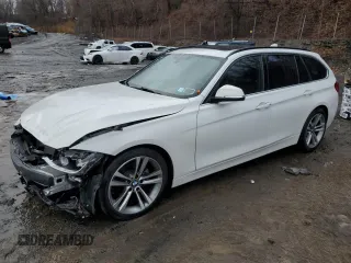 2018 BMW 3 Series 328d xDrive with VIN WBA8J1C50JA019038, listed as a Copart auction lot 85010124 with 61,073 mi miles and Salvage title. Bid and sale history available at DreamBid. Image 1.
