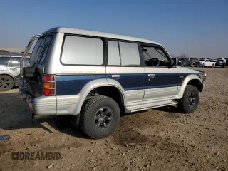 1995 Mitsubishi Montero z VIN V464049505, wystawiony jako Copart lot #83484024 z przebiegiem 158 151 mil mil oraz Szkoda całkowita • Salvage title. Historia ofert i sprzedaży dostępna na DreamBid. Obrazek 3.