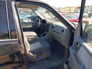 2004 Ford Expedition XLT with VIN 1FMPU16WX4LB12891, listed as a IAAI auction lot 41695636 with 209,574 mi miles. Bid and sale history available at carsss.com. Image 5.