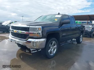 2016 Chevrolet Silverado 1500 LT with VIN 1GCRCREC4GZ164797, listed as a IAAI auction lot 41463630 with 97,262 mi miles. Bid and sale history available at carsss.com. Image 2.