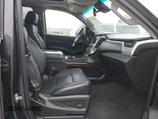2015 GMC Yukon SLT with VIN 1GKS1BKC6FR245564, listed as a IAAI auction lot 42139295 with 149,088 mi miles. Bid and sale history available at carsss.com. Image 5.