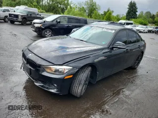 2015 BMW 3 Series 328i with VIN WBA3C1C57FP851680, listed as a Copart auction lot 61669795 with 86,556 mi miles and Salvage title. Bid and sale history available at DreamBid. Image 1.