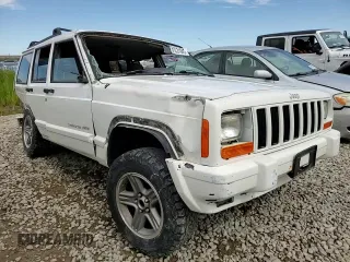 2000 Jeep Cherokee Classic с VIN 1J4FF58S7YL133399, выставлен на аукционе Copart как лот 61231845 с пробегом 196 499 миль миль и Списание • Salvage title. История ставок и продаж доступна на DreamBid. Изображение 14.