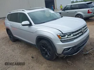 2018 Volkswagen Atlas SEL z VIN 1V2MR2CA8JC576442, wystawiony jako IAAI lot #42070991 z przebiegiem 137 682 mil mil oraz . Historia ofert i sprzedaży dostępna na DreamBid. Obrazek 1.