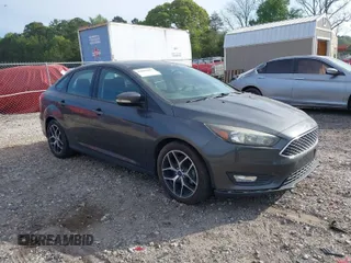 2017 Ford Focus SEL with VIN 1FADP3H22HL305908, listed as a IAAI auction lot 42084489 with 94,757 mi miles. Bid and sale history available at carsss.com. Image 1.