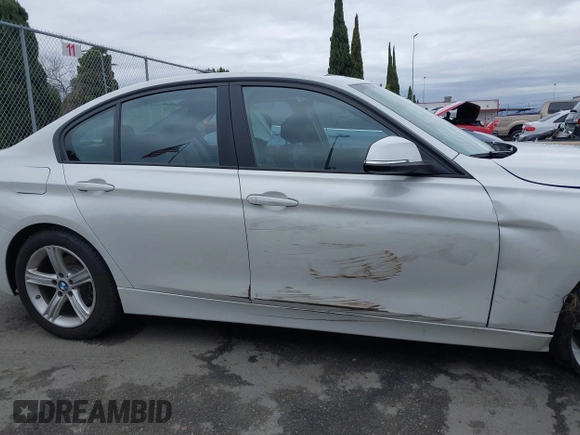2015 BMW 3 Series 320i with VIN WBA3B1C5XFK137171, listed as a IAAI auction lot 41736278 with 28,673 mi miles. Bid and sale history available at carsss.com. Image 13.