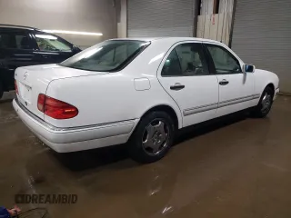 1997 Mercedes-Benz E-Class with VIN WDBJF72F6VA263199, listed as a Copart auction lot 43445715 with 121,444 mi miles and Salvage Title. Bid and sale history available at carsss.com. Image 3.